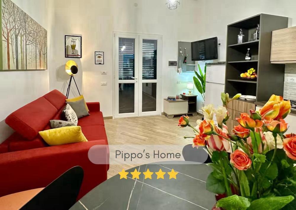 Foto di Pippo's Home ist ein modernes, einladendes Apartment mit privatem Außenbereich, gelegen zwischen Mondello und dem historischen Zentrum von Palermo. a Palermo
